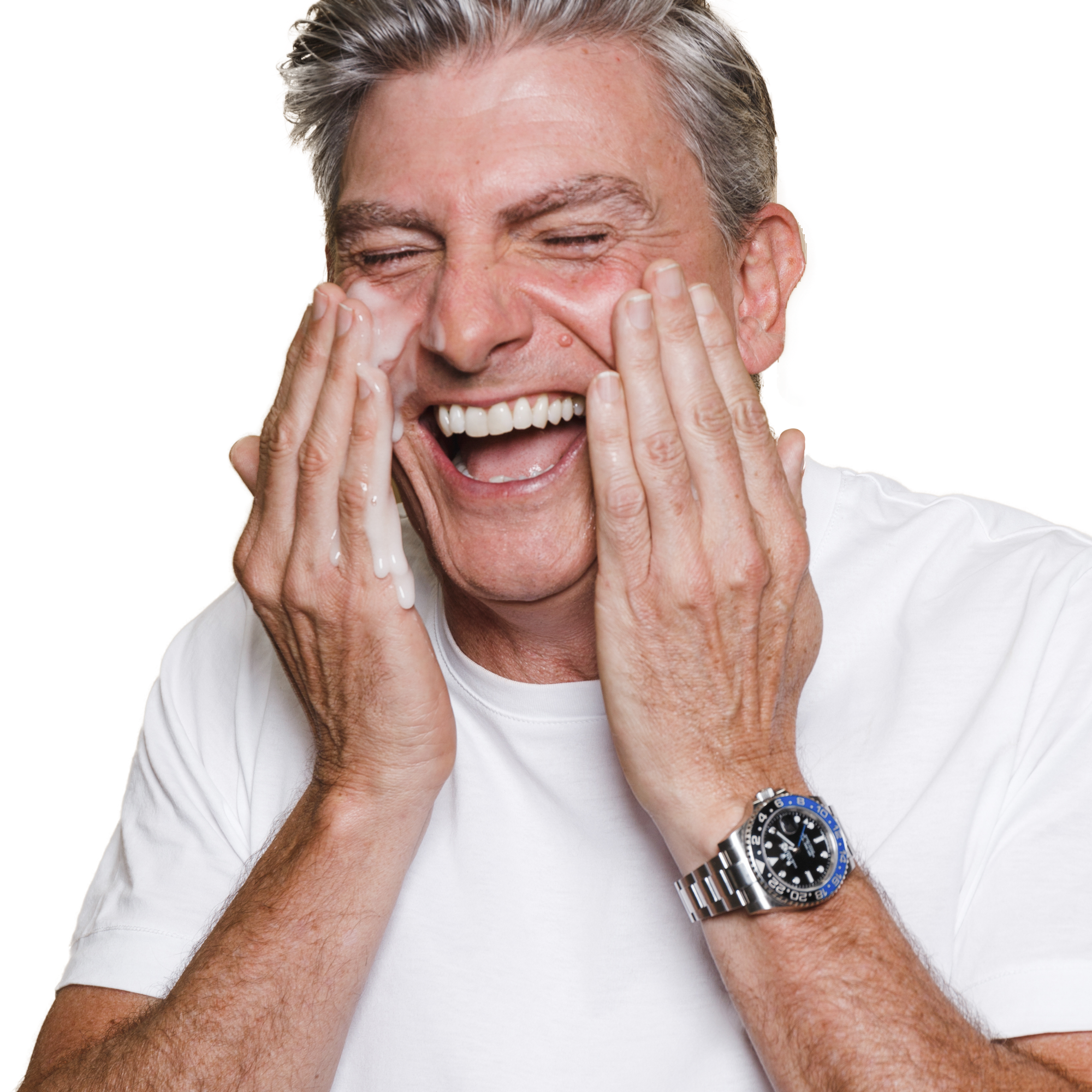 This man is placing his Hydroxy cleanser all over his cheeks ready to lather across his face! It is perfect for his normal to oily skin as it will clear his skin well without drying the skin out!