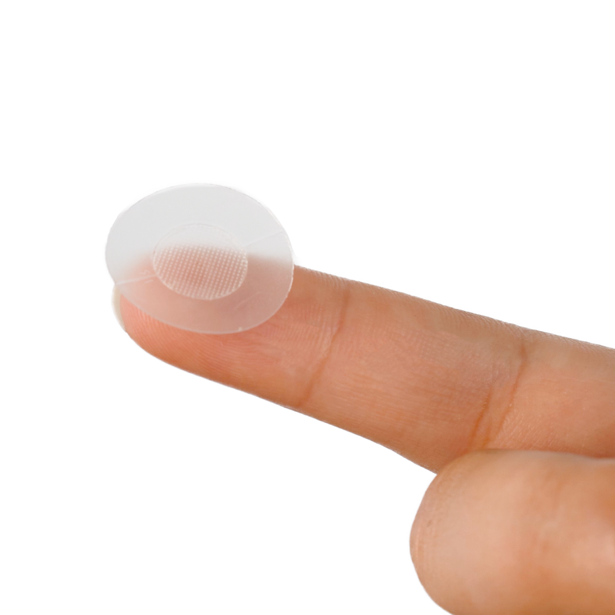 This is a close up photo of an individual acne patch. Banish and fade early stage pimples with 300 dissolving Hyaluronic Acid microneedles tipped with Salicylic Acid, Vitamin B3, Tea Tree Oil and Green Tea. microneedling pimple patches.