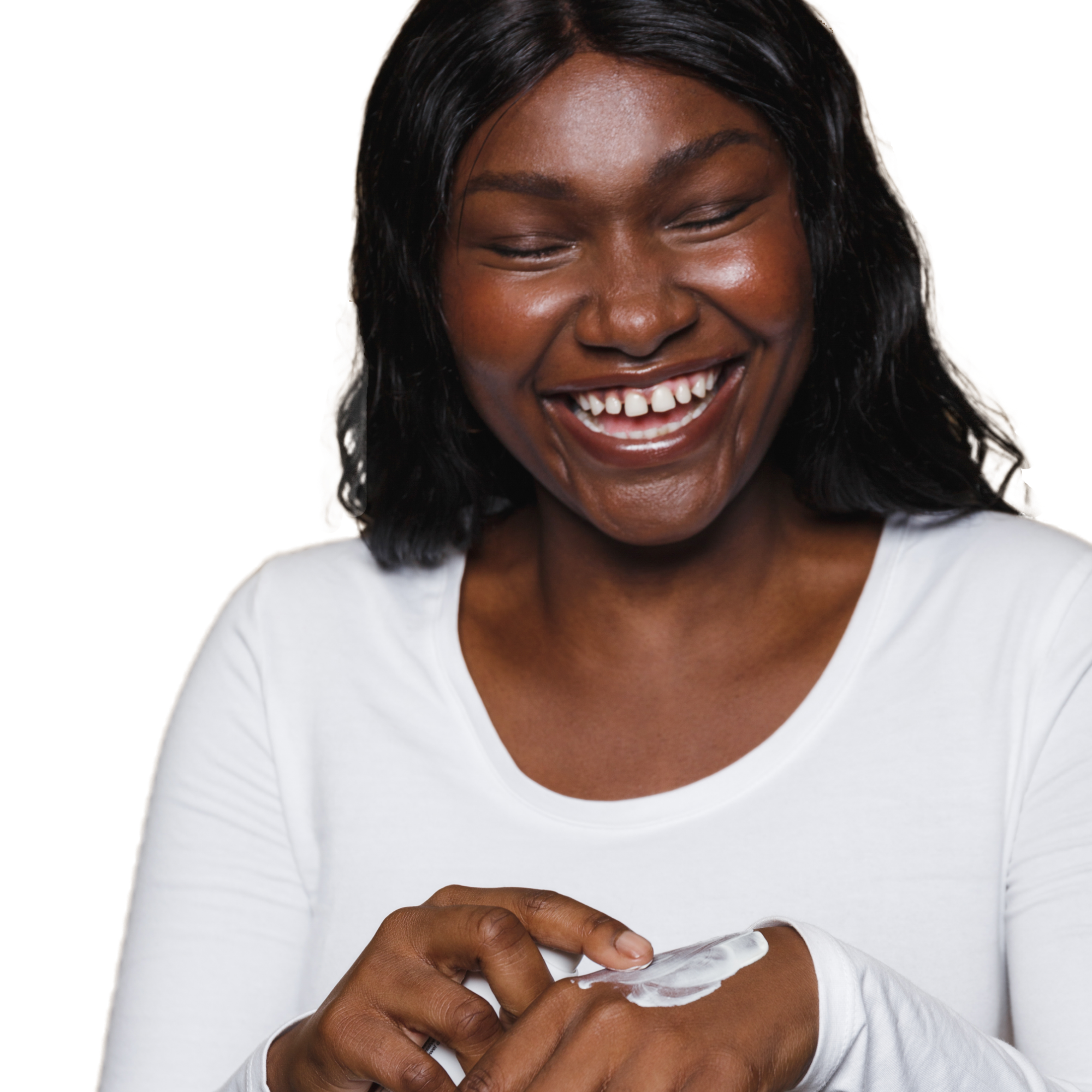 This image is of a lady applying her ESK Zinc Shade from the back of her hand onto her face. The texture of the cream is like a think moisturiser that is not oily, heavy or comedogenic! It can be used on sensitive skin, acne prone skin, oily skin and all skin types.