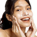 This woman is applying the Hydroxy Cleanser to her skin and rubbing it into her cheeks! It is lightly foaming to cover the skin evenly and cleanse deeply without being too harsh, drying or stripping to the skin!