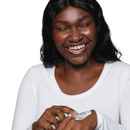 This image is of a lady applying her ESK Zinc Shade from the back of her hand onto her face. The texture of the cream is like a think moisturiser that is not oily, heavy or comedogenic! It can be used on sensitive skin, acne prone skin, oily skin and all skin types. 